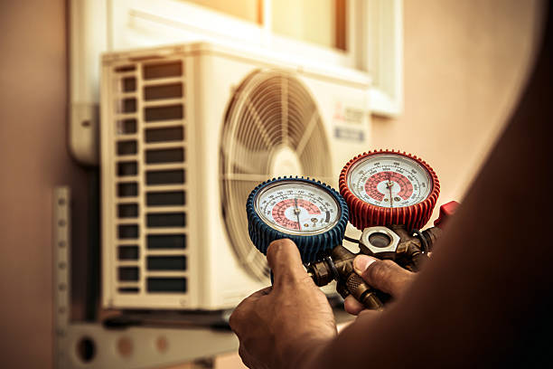Professional Air Conditioning Service technician working in Kensington, OH